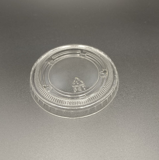 A recycle symbol in PET lid