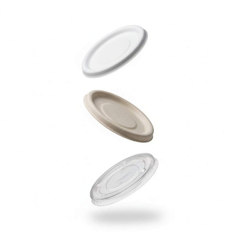 Eco-friendly compostable cups captured mid-drop to demonstrate lightweight design