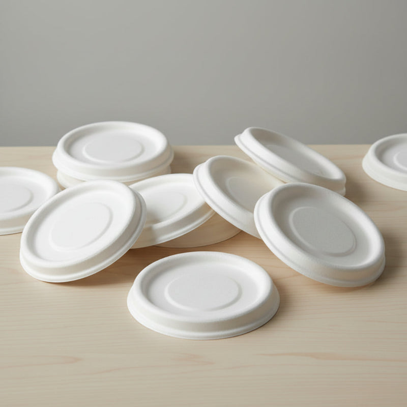 White sauce cup lids on the table